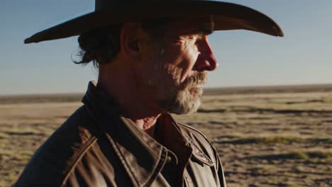 mature cowboy in the desert
