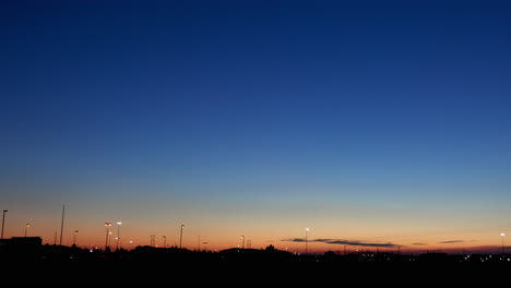 pan right on twilight suburban horizon.