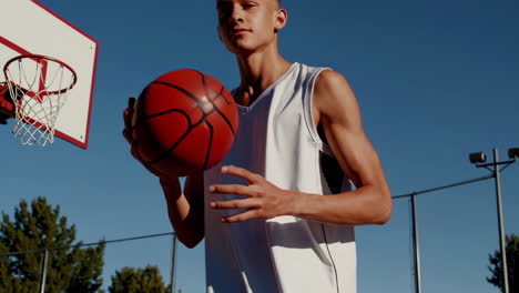 teenage basketball player on court