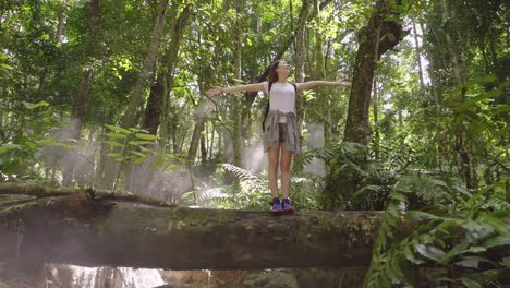 woman enjoying nature in a tropical forest