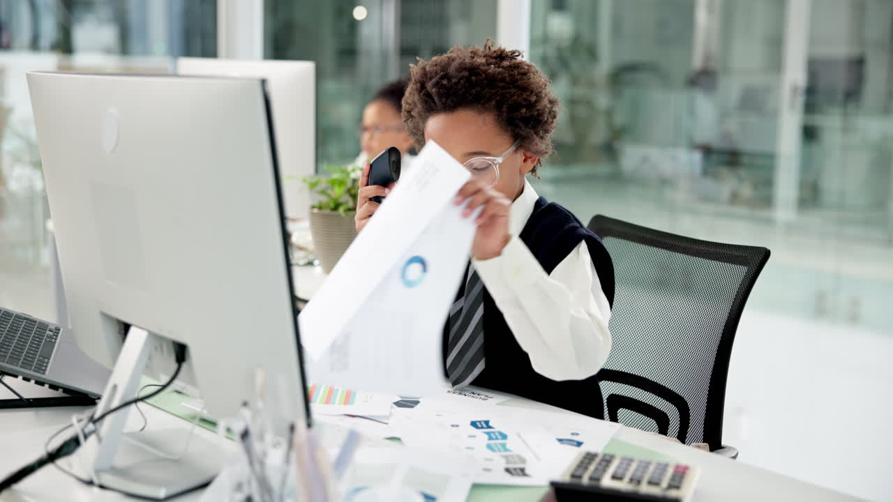 Boy Working in an Office