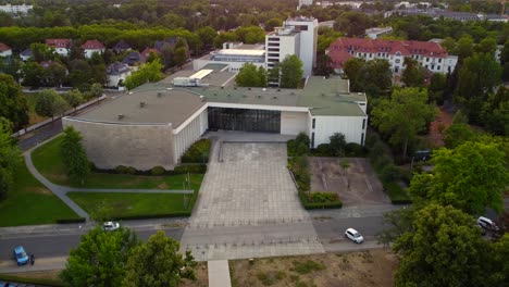 two students leave the henry ford building