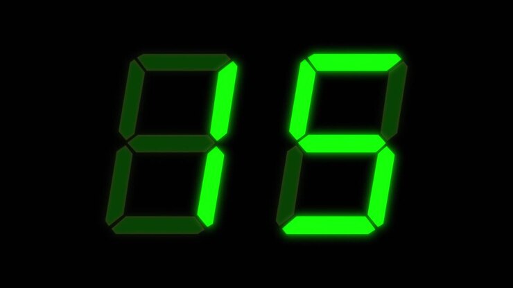 Green digital clockface with 2 digits. 30 seconds digital timer. Glowing green digits on black. Retro digital alarm clock animation element, glowing digital clock over black