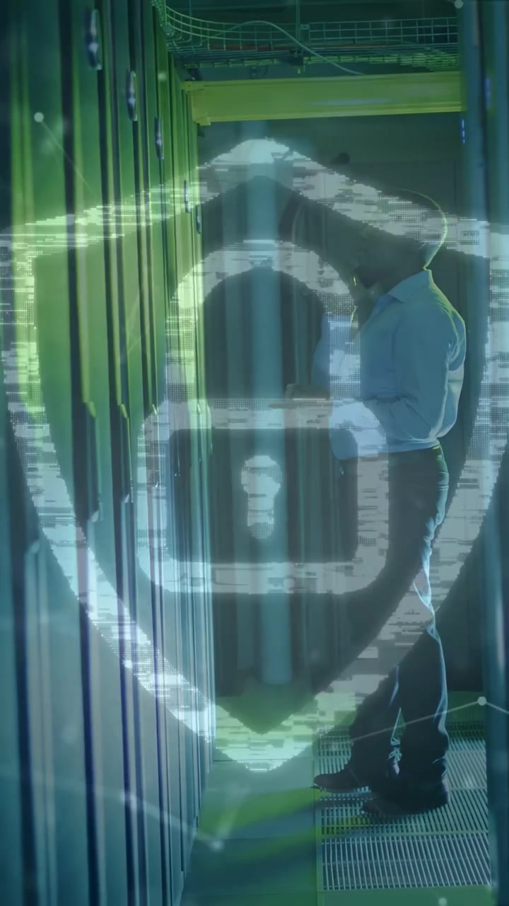 Vertical video: IT tech raising device and causing lock overlaying rack and man, checking access