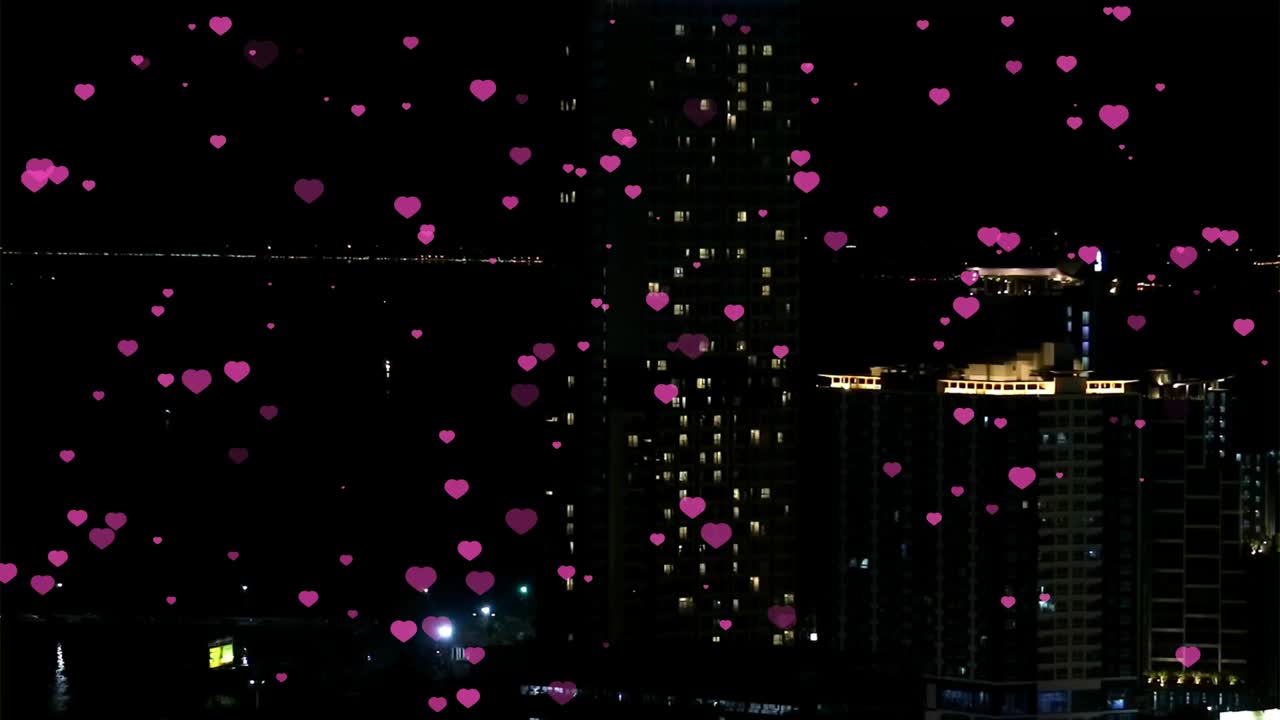 백만 개의 마음의 날개가 밤에 날아가는 발렌타인과 콘도와 도시 배경