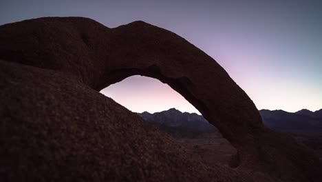 rock arch at sunrise/sunset in joshua tree national park