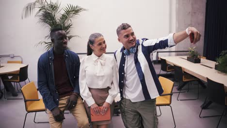 diverse colleagues taking a selfie