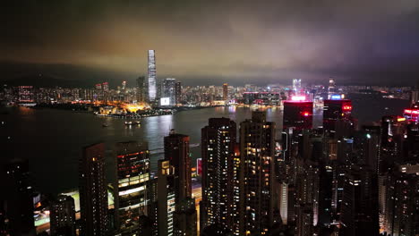 a view of a city at night from the top of a building