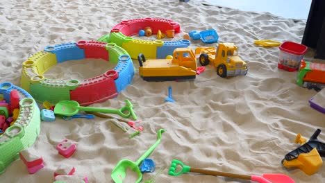 colorful toys in a sandbox