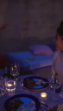 outdoor dinner party at night