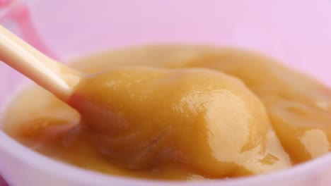 baby food in a bowl with spoon