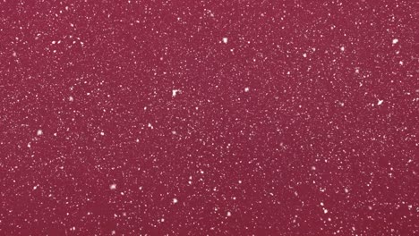 Animation-of-snow-falling-over-christmas-red-background