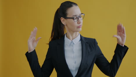 woman in business suit with neutral expression