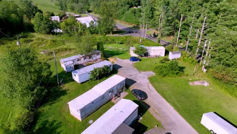 aerial pullout over trailer park in appalachia near fries virginia