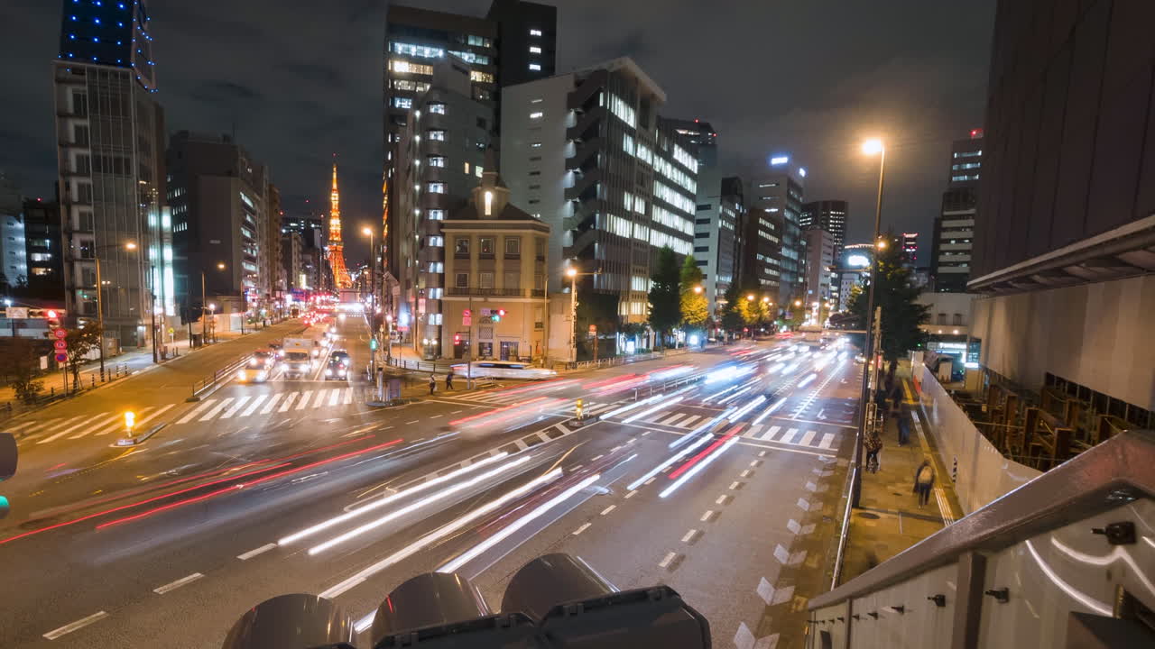 TOKYO, JAPAN - October 30, 2020 : Traffic flow at the junction at night in Tokyo city.