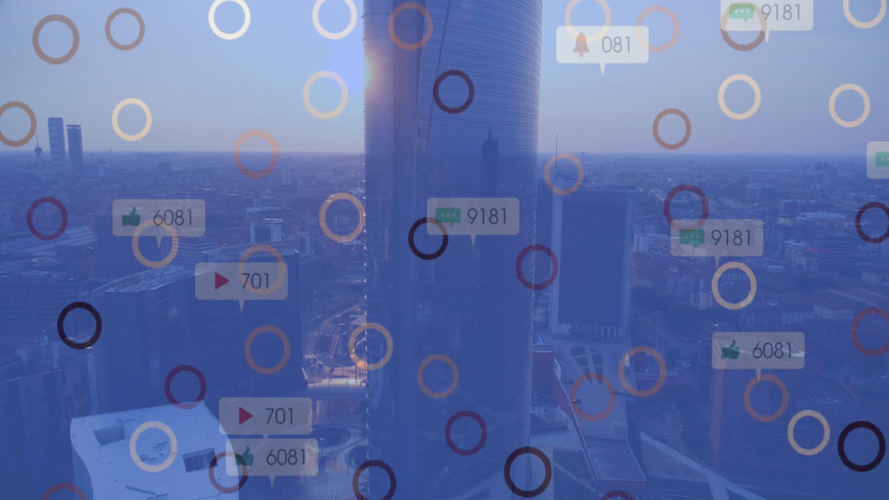 도시 풍경 위의 미디어 아이콘과 서클의 애니메이션