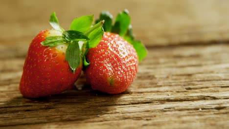 strawberries placed on wooden surface 4k 4k