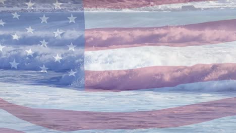 digital composition of waving us flag against waves in the sea