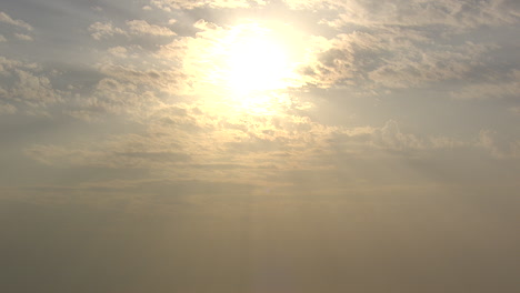 Sunbeams-shining-through-the-clouds--over-sea