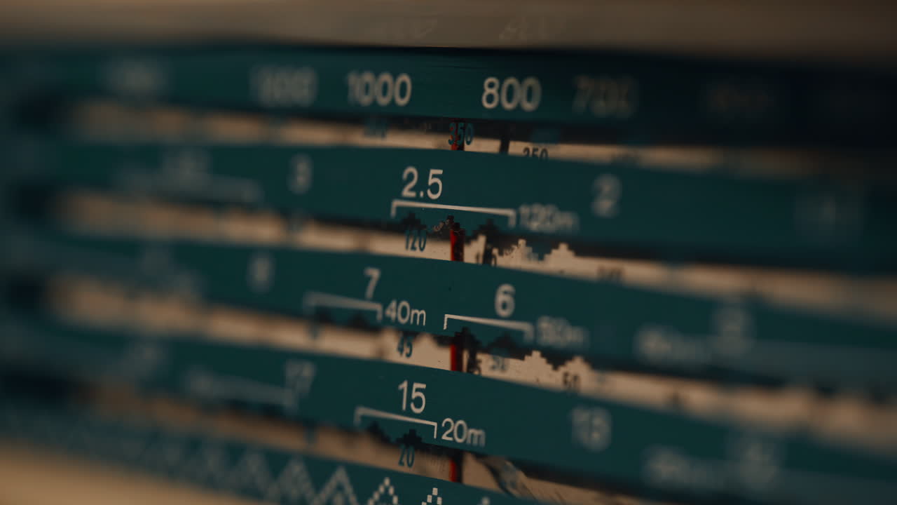 Vintage radio receiving signal in home closeup. Macro view retro speaker