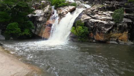 drone-shot,-Beautiful-rushing-waterfall,-Northern-Queensland,-Australia