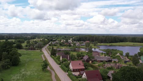 An-aerial-view-of-Livi-city,-highlighting-its-green-spaces-and-extensive-cycle-paths-next-to-the-main-road