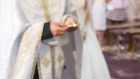 church attributes for wedding ceremony. gold crowns are on the altar. attributes of priest. interior of church