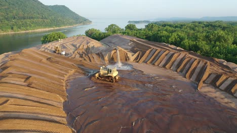 sand dredging operations on riverbank