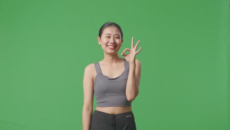 woman giving ok gesture