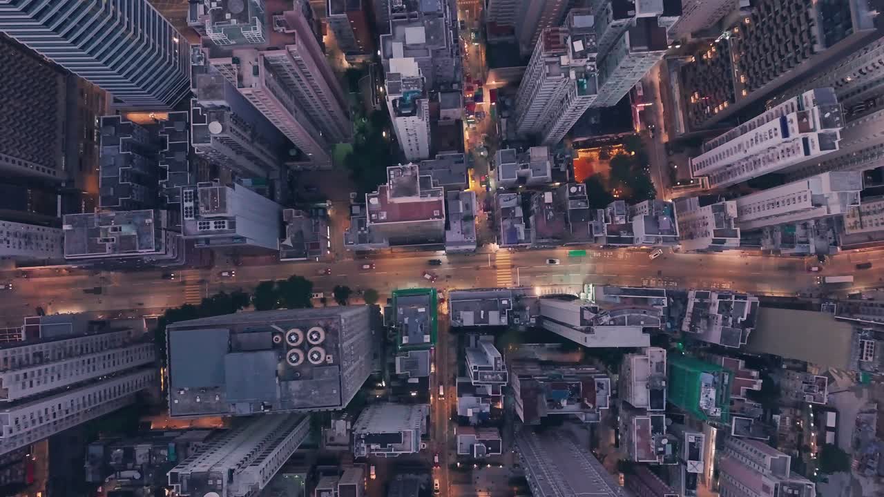 City centre traffic driving inHong Kong Island Central at night. Aerial drone view