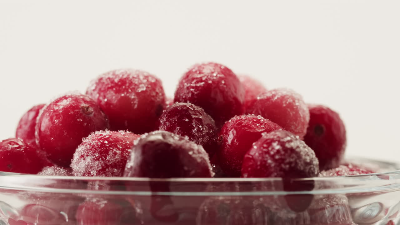 Frozen cranberries cooking for tea or jam, Background Close up of cranberry berries in on the kitchen, chef making dessert healthy pie.