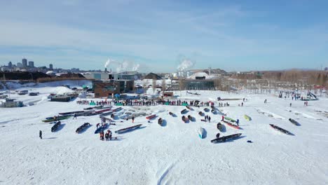 drone pan right, people preparing for canoe race 2