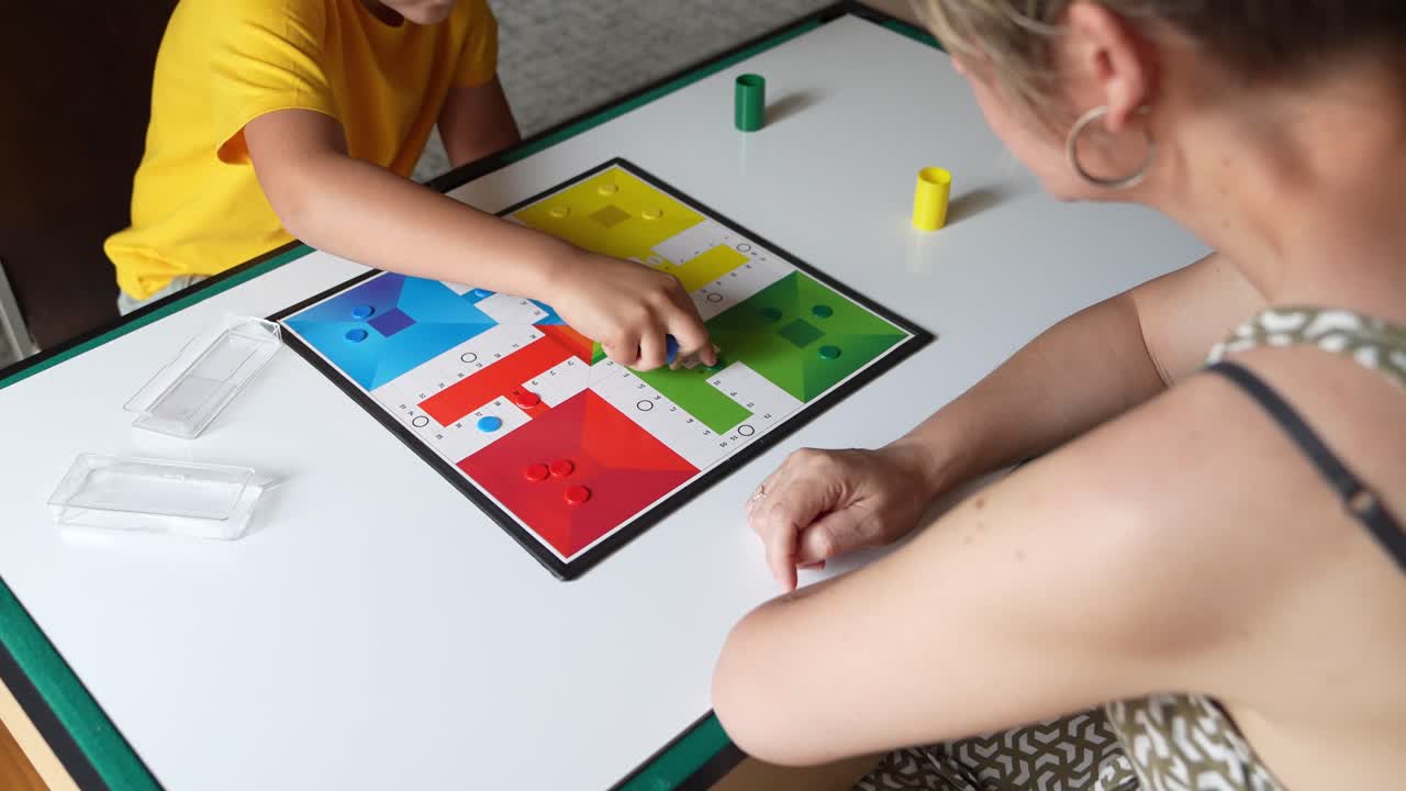 People playing board game