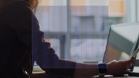 animation of statistics and financial data over caucasian businesswoman using laptop