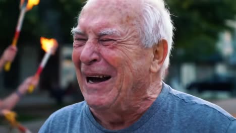 a heartwarming moment captured: the joyous laughter of an elderly man surrounded by celebratory flames, embracing life's little pleasures with glee
