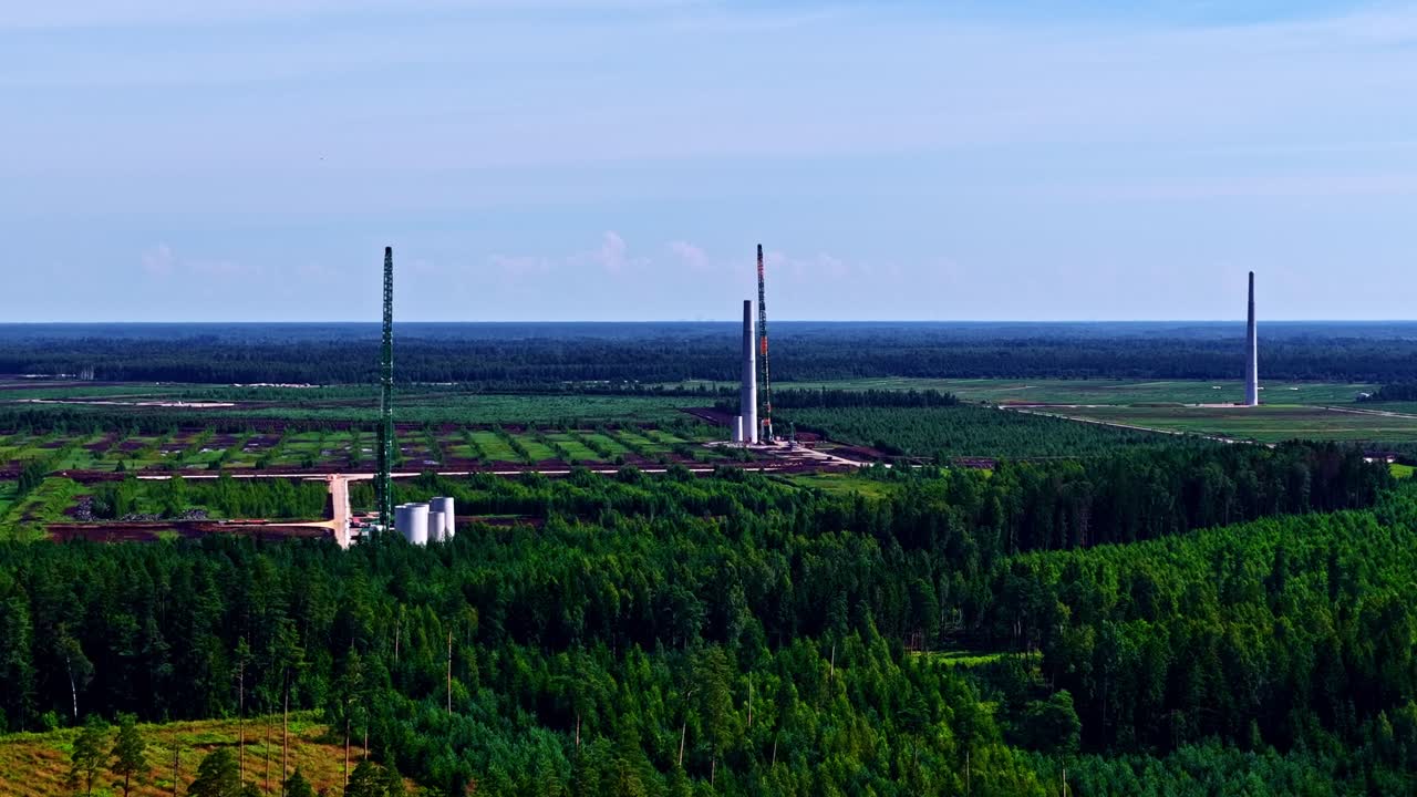 Renewable energy Wind turbine farm under construction building progress, aerial drone