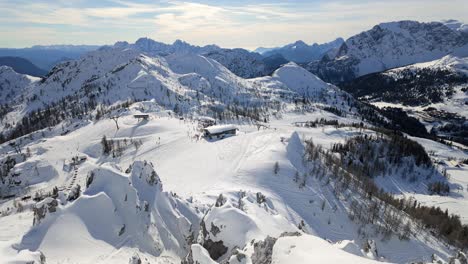 panoramic look of the gorgeous snowy valley of the alpine ski resort nassfeld with mountains in the background in austria