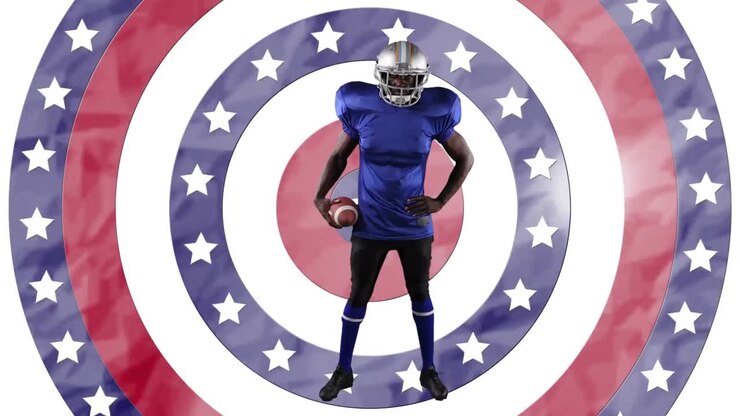 afrikanisch-amerikanischer männlicher rugby-spieler, der einen ball gegen sterne in drehenden kreisen hält