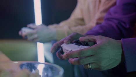 close up view of a young boy's hands holding a gamepad