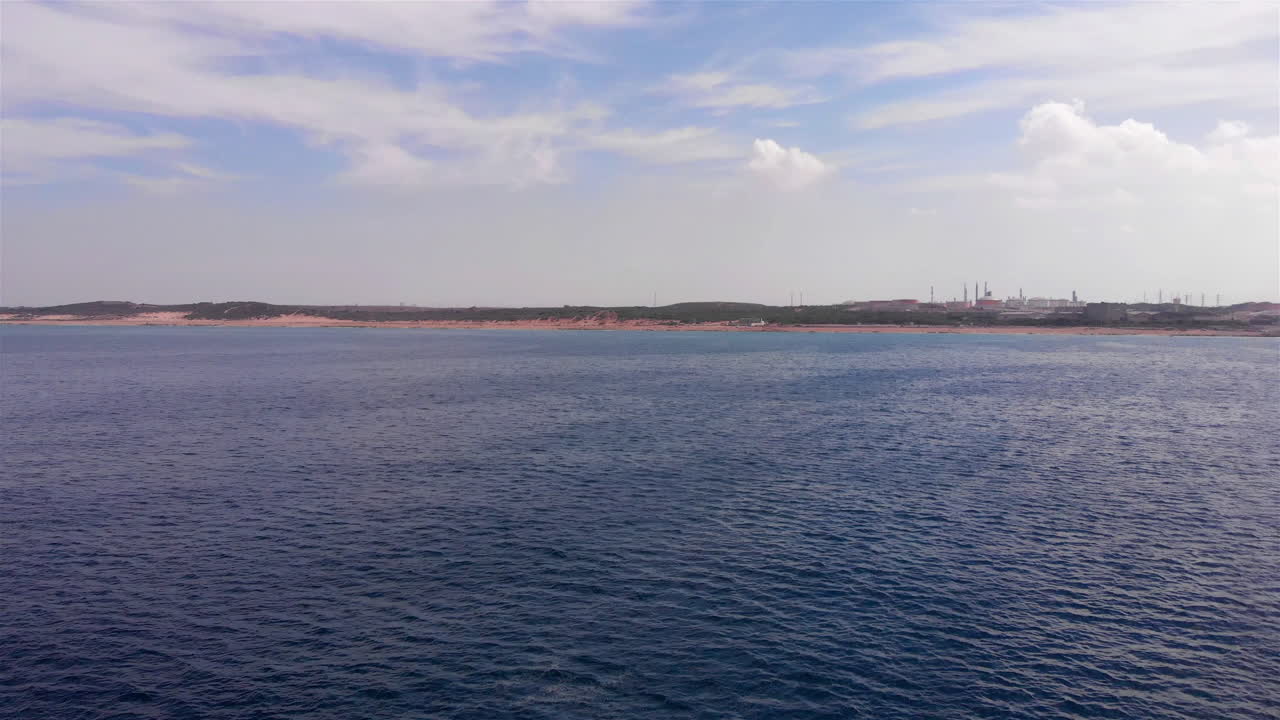 Aerial footage over Mediterranean Sea And empty beach