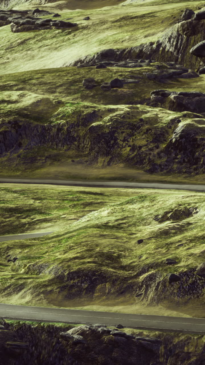 Misty volcanic terrain with layered ridges and sparse vegetation