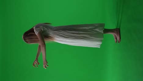 levitating ghostly woman on green screen
