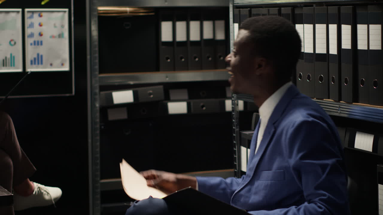 Business meeting in a dark office
