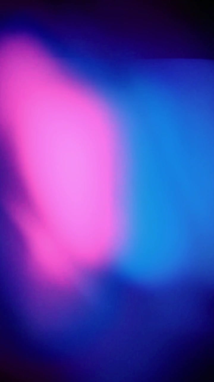 Soft Shifting Abstract Pink and Blue Light Background