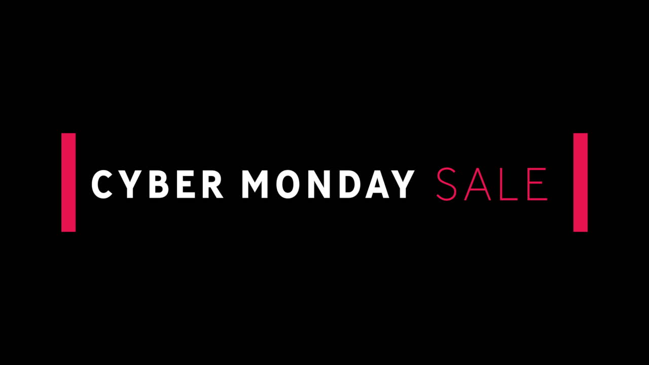texto de venta blanco y rojo de cyber monday que aparece contra una pantalla negra