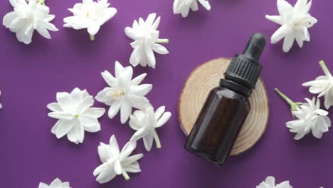 jasmine essential oil with flowers