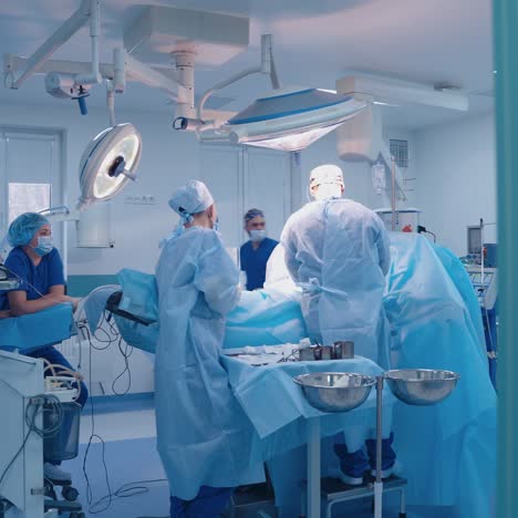 team surgeon at work in operating room. modern equipment in operating room. medical devices for neurosurgery.
