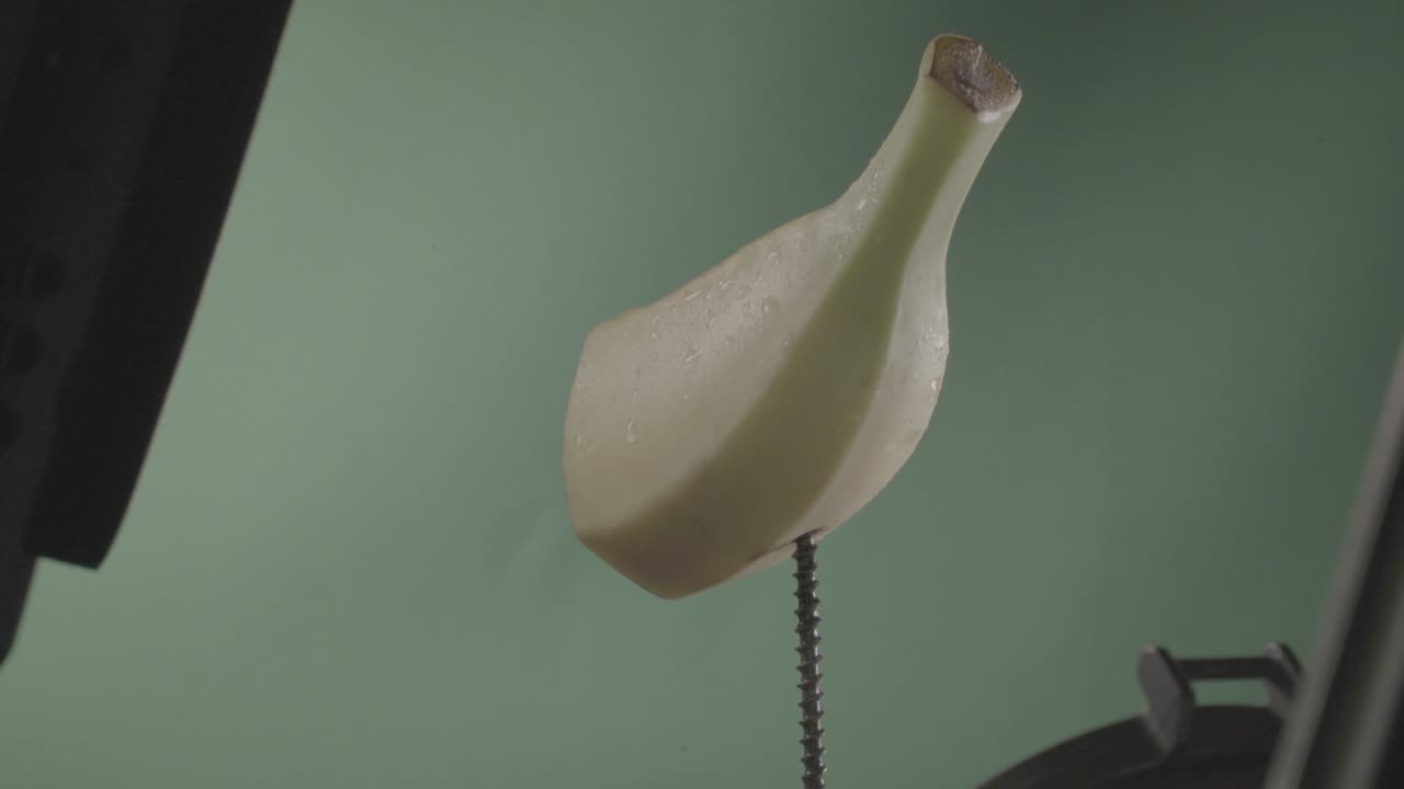 plátano girando con bucle en pantalla verde para la llave de croma