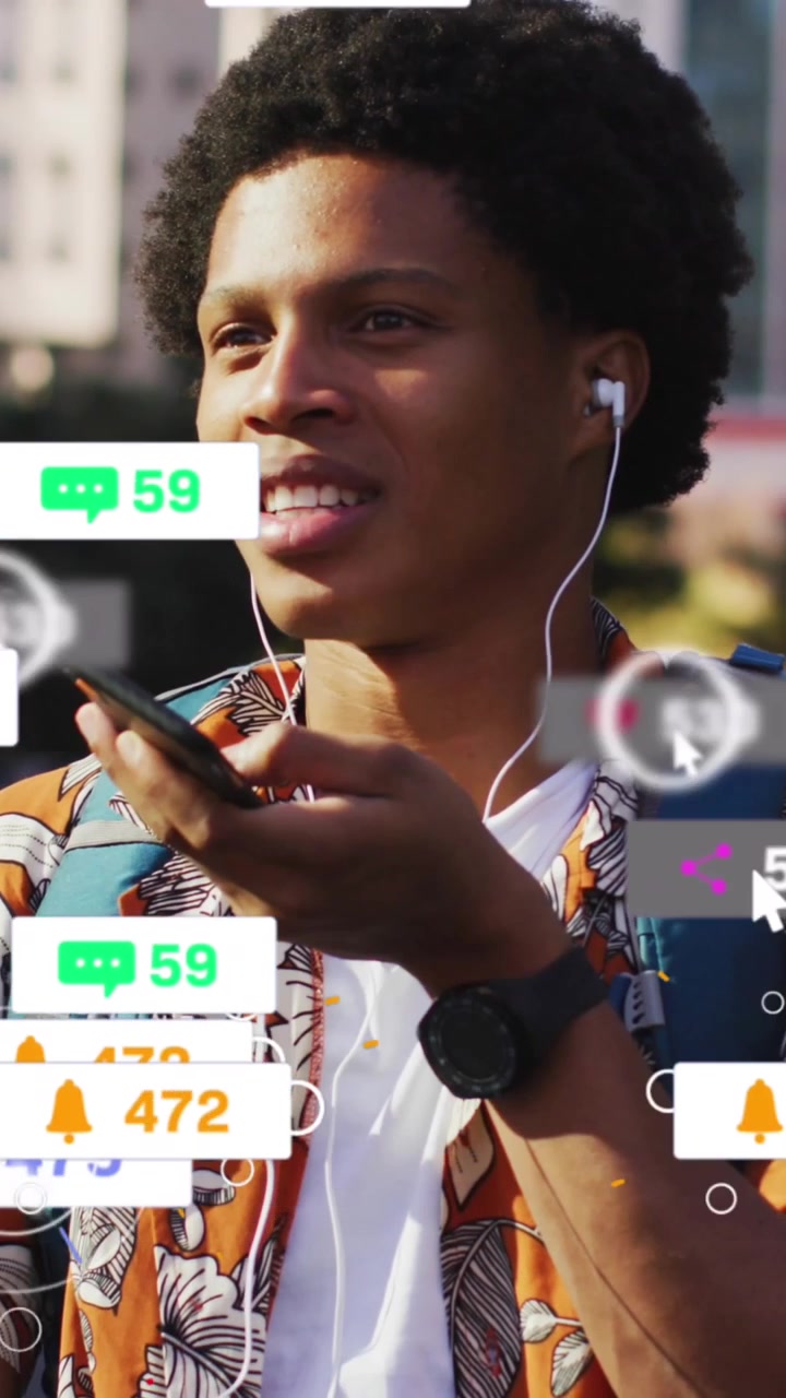 Animation af medieikoner over en afroamerikansk mand, der bruger en smartphone