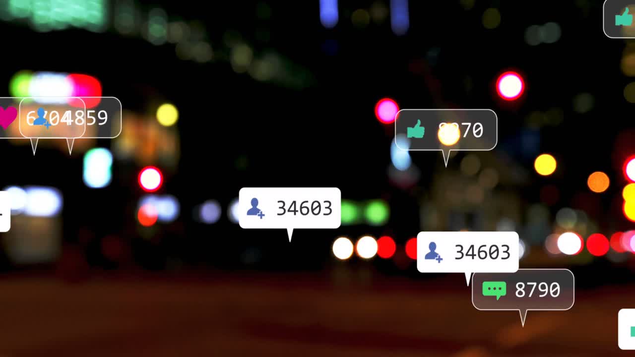 소셜 미디어 아이콘과 숫자의 애니메이션 초점이 맞지 않는 도시 불빛